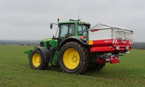 Tractor spreading tillage